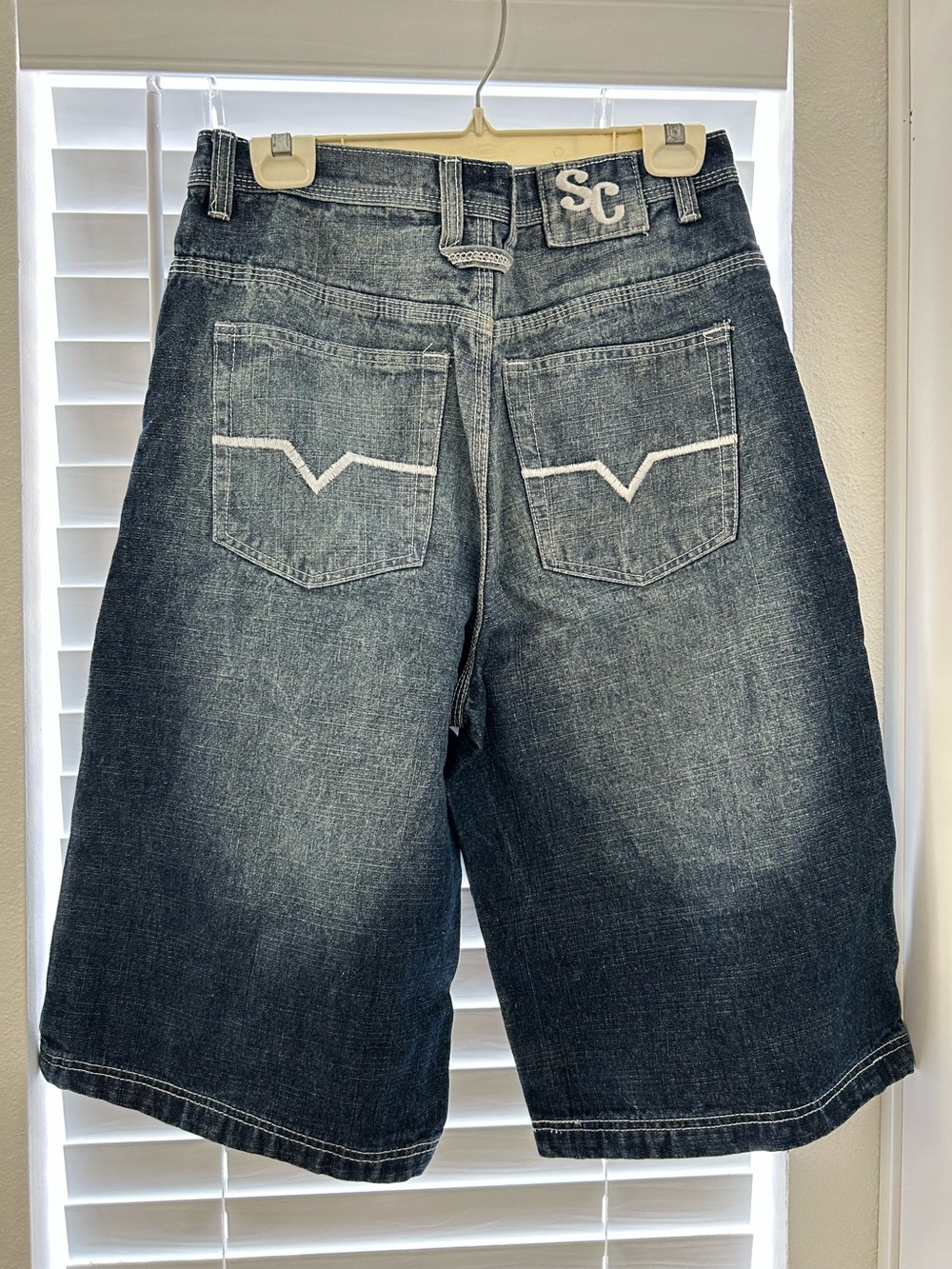 Men’s Sacred Cult Baggy Denim Shorts with Blue Skull Stud Accents - Picture 2 of 12